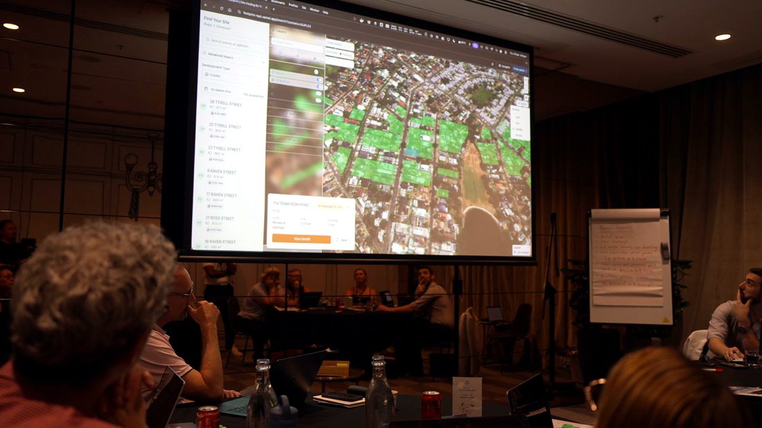 Site feasibility mapping on screen at a member session